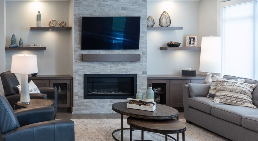 Family room with TV over the fireplace