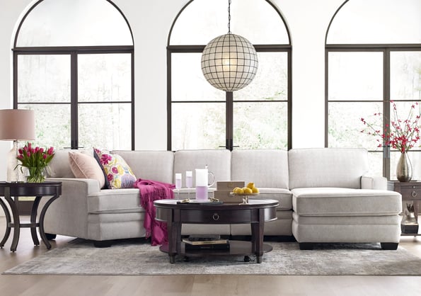white sofa with pink accent