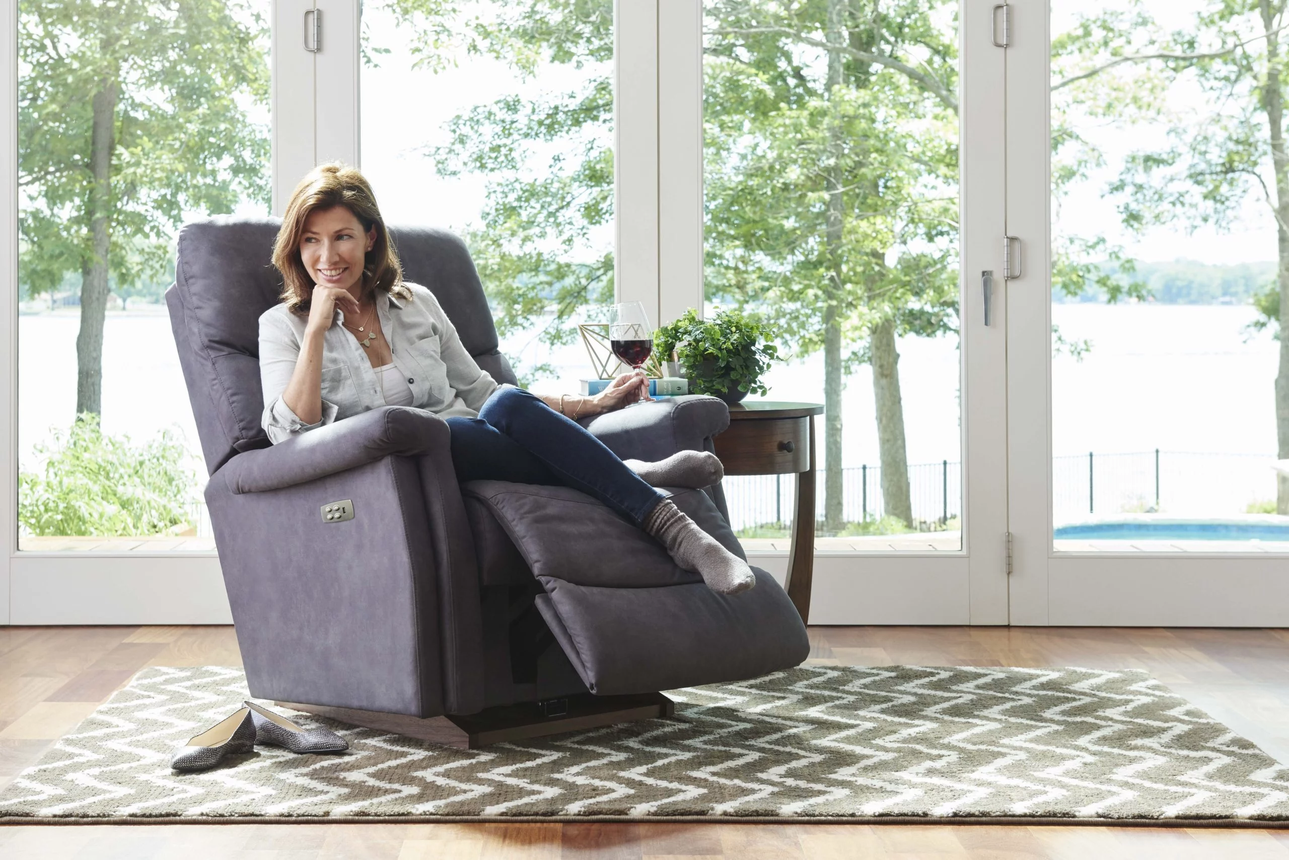 Woman lounging on Power Recliner How Dependable are Power Recliners